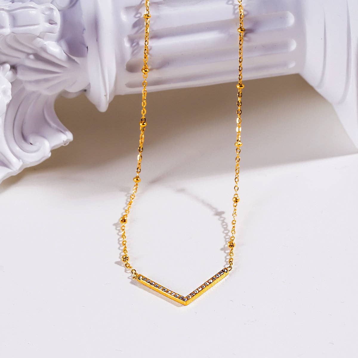 Beaded Dainty Chain Anchoring 'V' Shaped Zirconia Embedded Pendant Charm Necklace