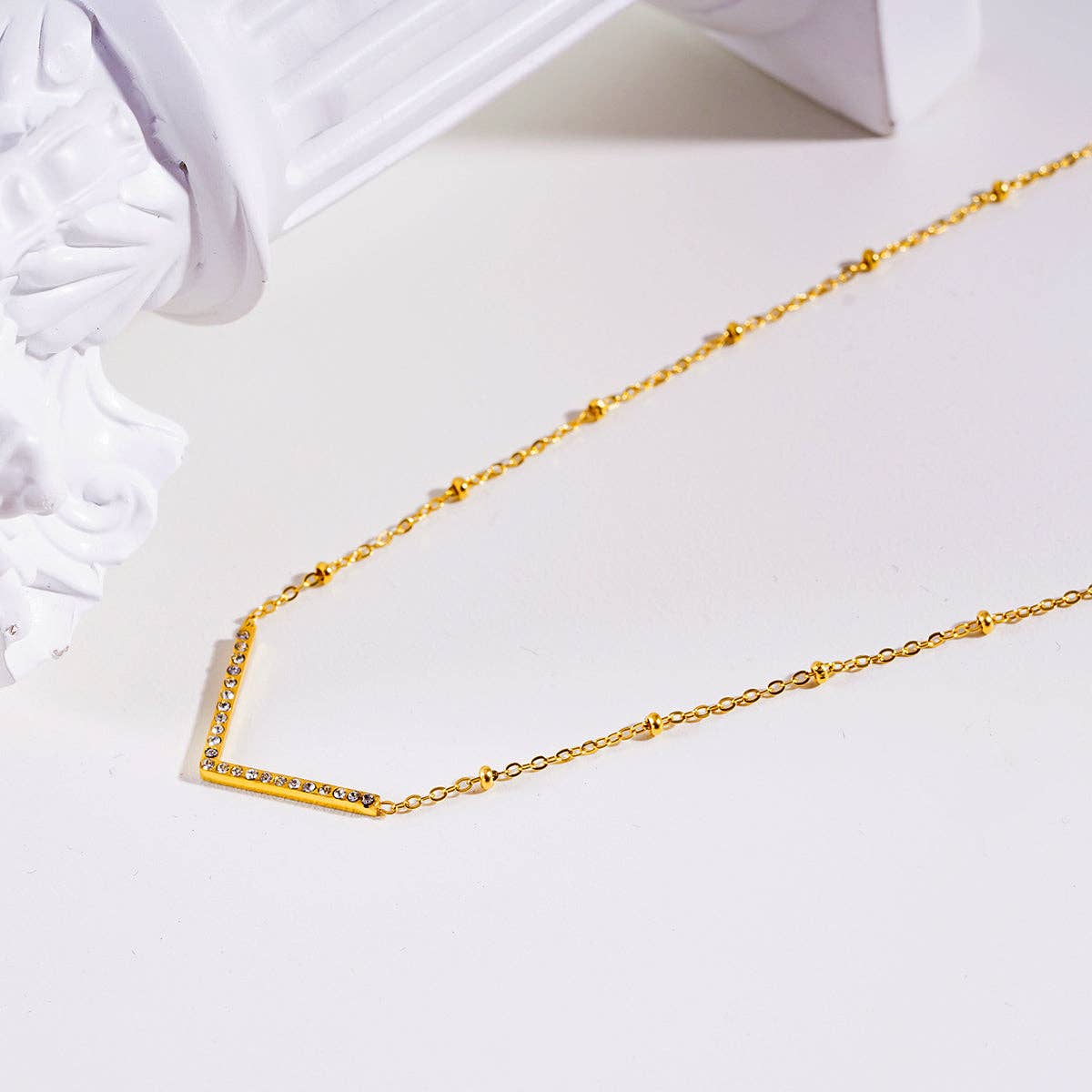 Beaded Dainty Chain Anchoring 'V' Shaped Zirconia Embedded Pendant Charm Necklace