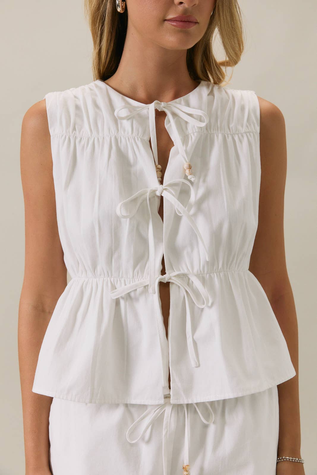 FRONT TIE CINCHED LINEN TOP WITH FRONT TIES AND BEAD TRIM
